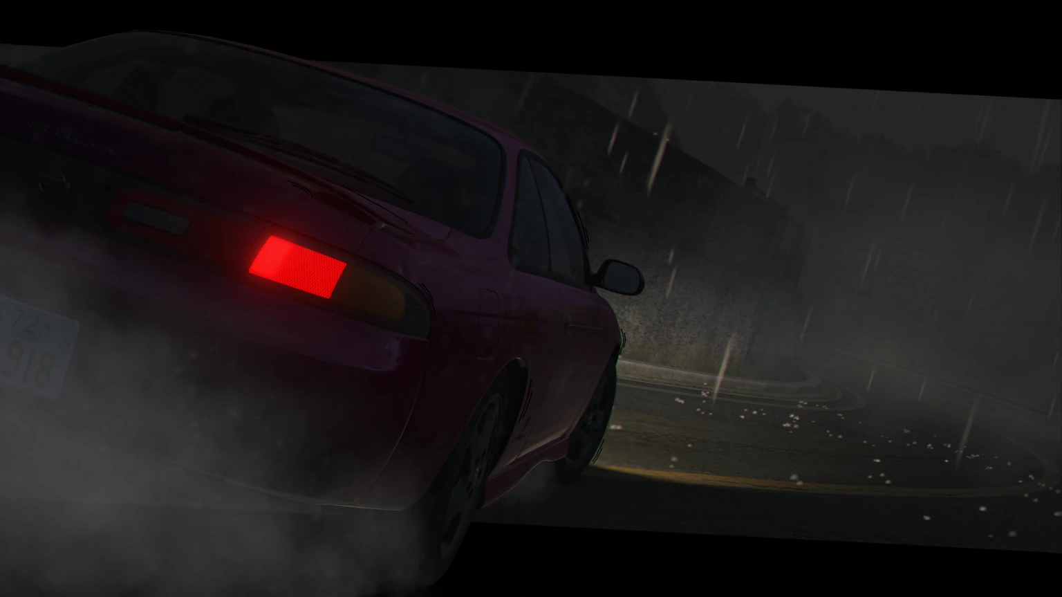 A red Silvia S14 sliding through a corner at night